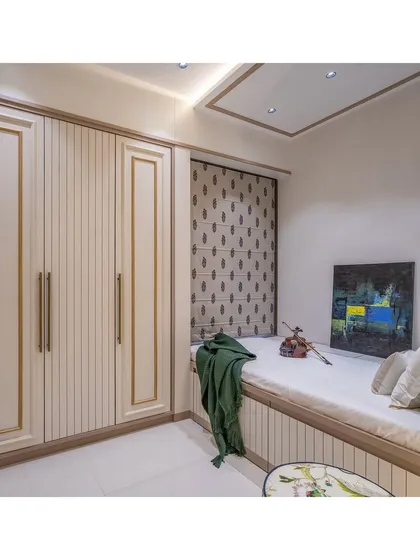 The full view of the compact room shows the wardrobe and window seat bed, demonstrating our expertise in creating stylish and practical solutions for small bedrooms.