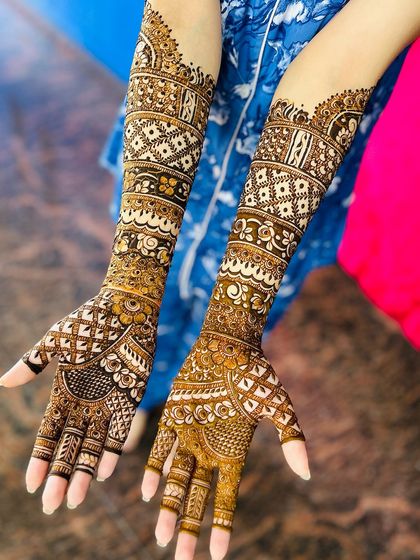 An elegant and simple design for a bride who wanted something less dense. The patterns are based on traditional bands and checks.