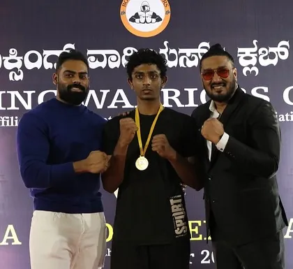 Hard work earns results. I'm proud to stand with one of my students after he earned his medal at a local boxing event.