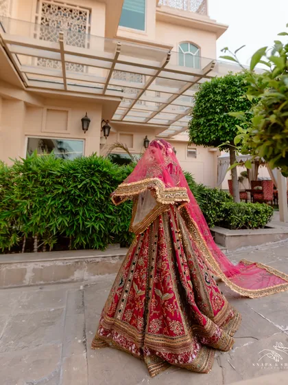 This is one of my real brides. We worked closely with the designer to custom-make her entire bridal outfit on a tight deadline, focusing on every detail to ensure her vision came to life perfectly for her big day.