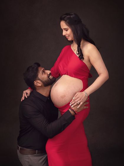 A partner's loving gaze. He looks at her with so much admiration as he connects with their baby.