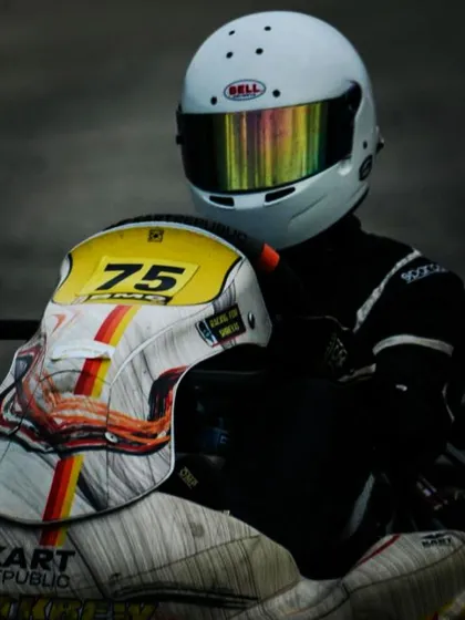 A close-up of a driver in his kart.