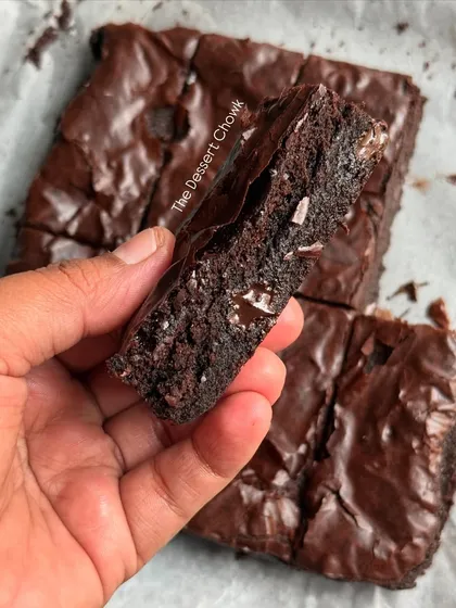 A close-up showing the dense, fudgy interior of my classic chocolate brownie. It's rich, moist, and everything a brownie should be.