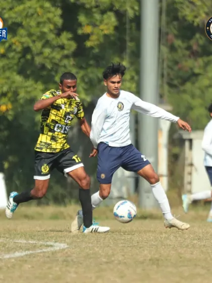 A fast-paced chase for the ball, highlighting the speed and agility of our players.