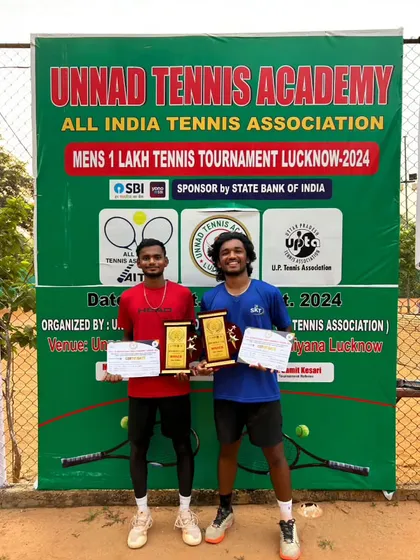 NTC's Sajal Kesharwani and his partner celebrate their Men's Doubles win at the AITA 1 Lakh Tennis Tournament in Lucknow.