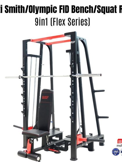 The Multi Smith machine shown with the bench in a vertical position, ready for use with the cable pulleys or other attachments.