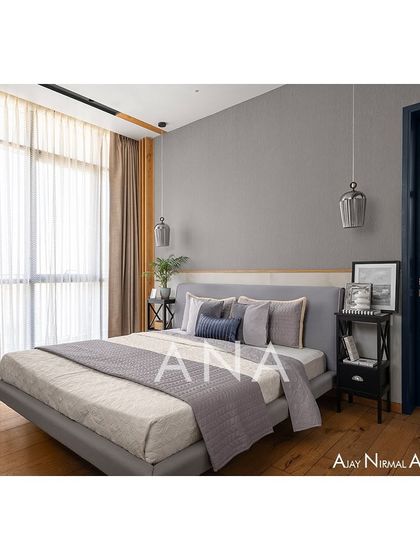 The master bedroom in Apartment 704, showing the fluted glass door that connects it to the rest of the house. This element ensures privacy while allowing for a visual flow of light.