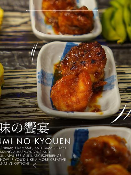 Sanmi no Kyouen, a "feast of three flavors." This appetizer plate features teriyaki shrimp, edamame, and tamagoyaki (Japanese rolled omelet), offering a harmonious tasting experience.