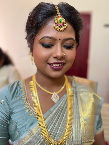 A close-up of Dr. Mithra's engagement eye makeup. The smokey effect is blended to perfection, creating a sultry and glamorous look.