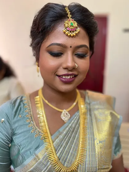 A close-up of Dr. Mithra's engagement eye makeup. The smokey effect is blended to perfection, creating a sultry and glamorous look.