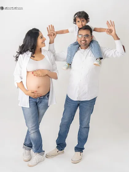 A playful family portrait filled with joy. Having fun during the session is the best way to get genuine smiles and create memories, not just photos.