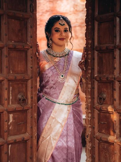 The bride framed by antique wooden doors. I love using architectural elements to create interesting and beautiful compositions for bridal portraits.