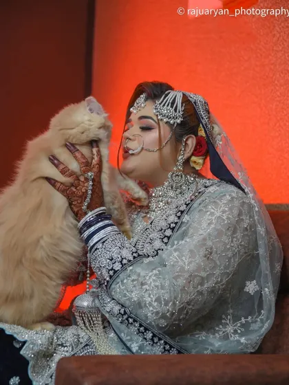 A heartwarming and unexpected moment between a bride and her beloved pet cat on her wedding day. This image shows my passion for capturing the personal, unscripted stories that make your day truly unique.