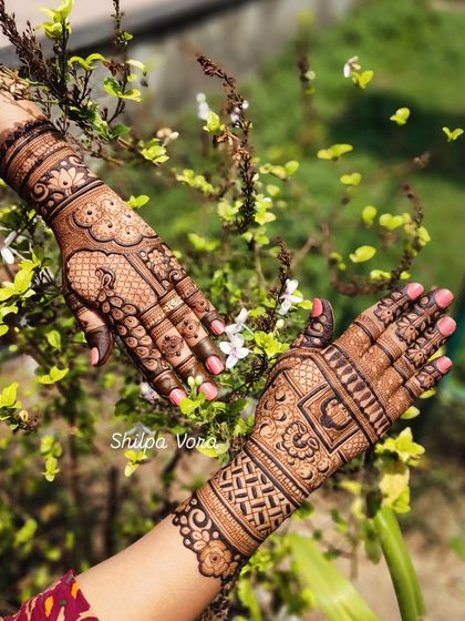 A beautiful shot of two different but complementary designs, showcasing my versatility in traditional patterns.