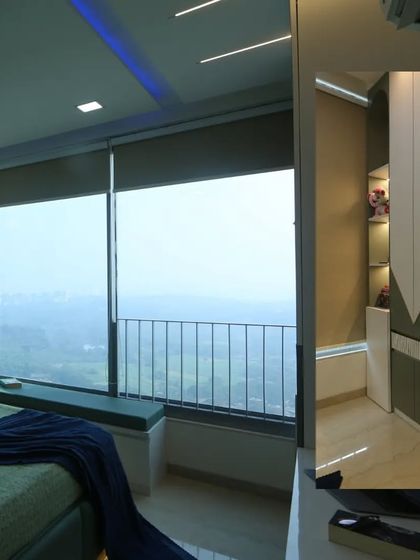 This shot highlights the stunning view from the master bedroom, with a cozy seating area built into the window frame.