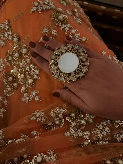 Accessories make the outfit. This oversized mirror-work ring was the perfect statement piece to complement the traditional vibe of my saree.