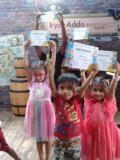 A group of proud campers from our Bannerghatta Road location holding up their certificates after a fun-filled and creative camp session.