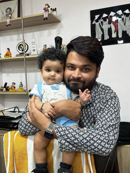 A precious moment with my son in the office. It's a reminder of the 'why' behind all the hard work and motivates me to help other families build a secure future through their businesses.