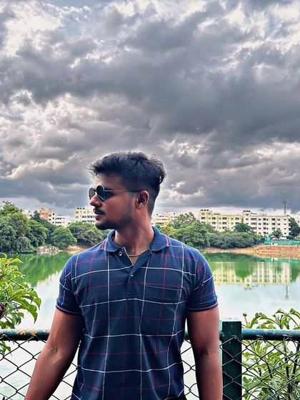 The dramatic clouds over the lake create a stunning backdrop for a photo.