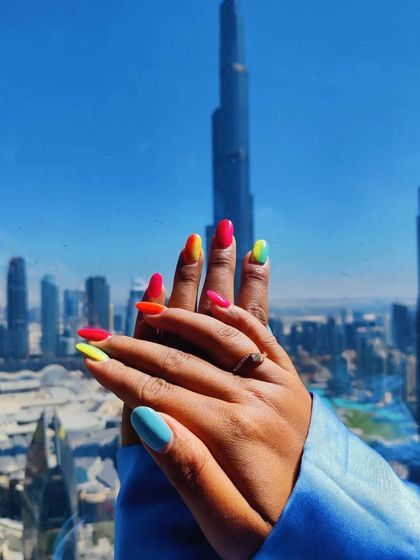 Happiness is when a client sends holiday photos from Dubai. How gorgeous do these ombré summer nails look against the breathtaking Burj Khalifa?