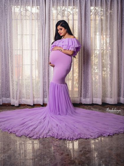 A duplicate of 107, this image is a perfect example of a high-fashion, dreamy maternity portrait that we can create in the studio.