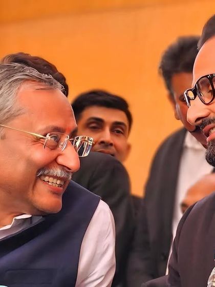 Sharing a smile with a senior member of the bar. These relationships, built on mutual respect, are the foundation of my work.