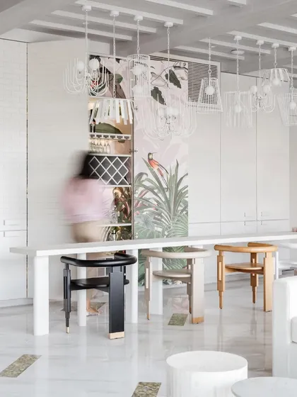A motion-blurred shot capturing the magic of opening the Reveal Bar in House No. 7. It's a space designed for surprise and delight.