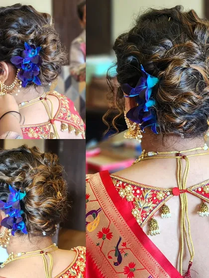 This is not naturally curly hair. We created this beautiful curly French twist updo and adorned it with fresh orchids for a unique bridal look.