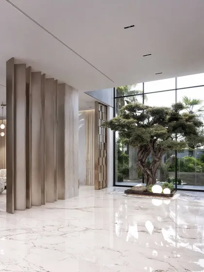 A wide shot of the hallway in the Dubai residence, with the indoor tree as a focal point, seen through the elegant partitions.