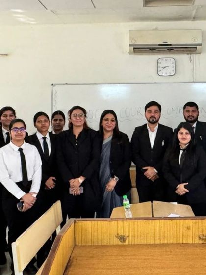 A group photo with the student participants and my fellow judges. These bright young individuals represent the promising future of the legal profession in India.
