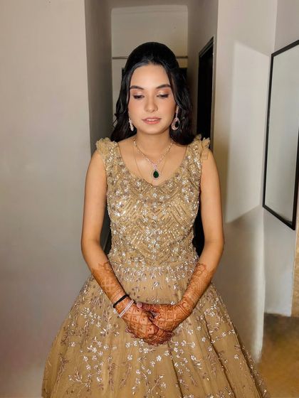 A close-up of the soft glam makeup. The focus is on radiant skin and subtly enhanced features, perfect for a Roka ceremony.