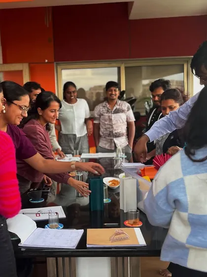 Collaboration is key to our success. This image shows our team actively participating and sharing ideas during a session on integrating technology into design.