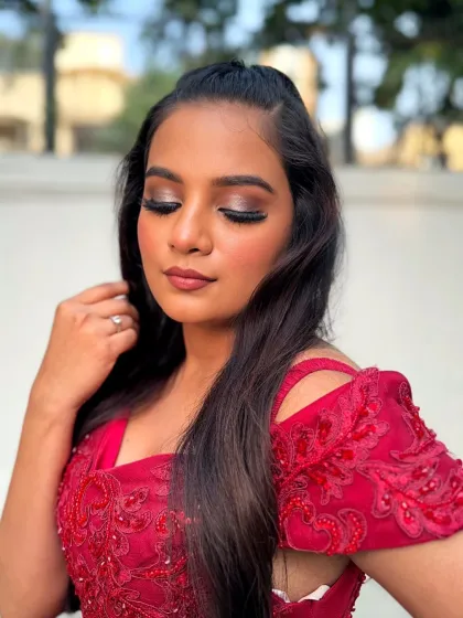 A close-up on the eye makeup, showcasing the perfect blend of colors for a glamorous evening look.