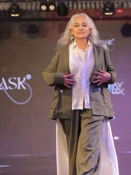 Another shot of the runway look, showing her confidence and poise as she walks the ramp. The makeup holds up perfectly under the bright lights.