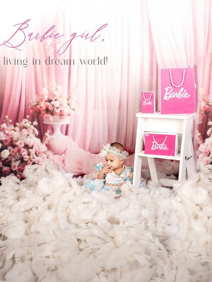A Barbie girl living in a dream world. This photo captures the magical, ethereal quality of our popular Barbie-themed photoshoot.