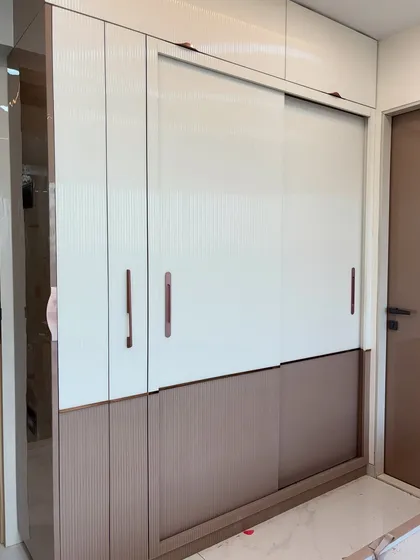 A final shot of the wardrobe, closed, showing its clean and modern aesthetic.