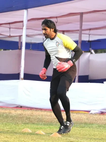 An instructor demonstrates a footwork drill during the football goalkeeping clinic. Practical, on-field application is a core component of our training, allowing coaches to immediately see and practice new techniques.