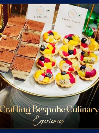 Crafting bespoke culinary experiences, one dessert at a time. This platter showcases our classic Tiramisu cups and vibrant Fresh Fruit Tarts, offering something for every palate.