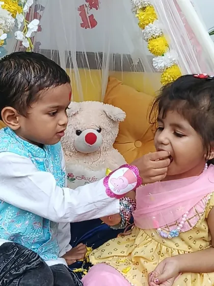 The pure bond of a brother and sister is so special. This little brother lovingly feeds his sister, a heartwarming moment from our Rakhi celebrations at the daycare.
