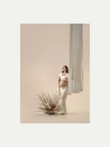 A similar pose to the previous shot, this image offers a slightly different angle, showcasing the clean lines and peaceful atmosphere of our minimalist studio setups.