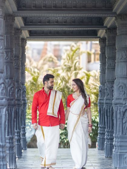 A romantic walk through a temple corridor. I can help you style the perfect traditional look for your pre-wedding shoot.