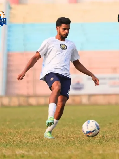 A player dribbles with close control, demonstrating their technical ability.
