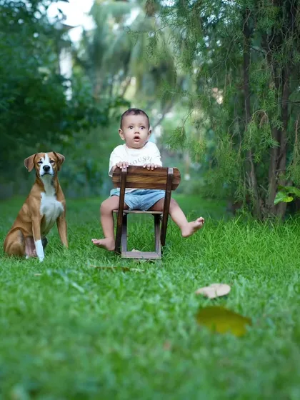 Best friends from the start. Including family pets in photoshoots always adds an extra layer of warmth and personality to the session.
