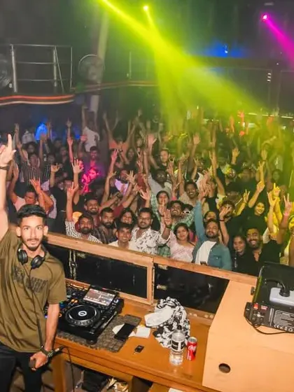 The crowd at Cafe Mambo, completely lost in the music. My focus is always on building a strong connection with the audience through the tracks I play and produce.