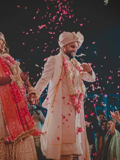 A shower of petals rains down on the happy couple as they celebrate their union. We use special effects to enhance the joy of these moments.