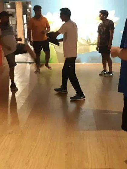 Group training builds a strong unit. Here, students practice kicking drills together, learning from each other and pushing one another to improve.