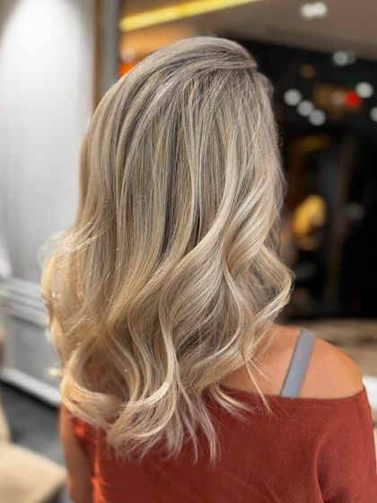 Another angle of the platinum bond highlights, capturing the hair's healthy shine and beautiful cool tones.