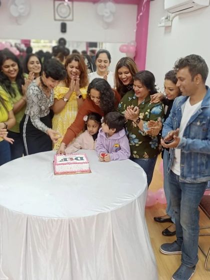 Another happy moment from the cake-cutting. We love involving everyone in our celebrations.