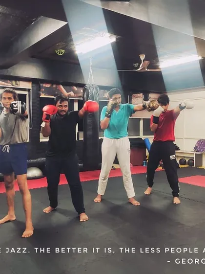 As the quote says, "Boxing is like jazz. The better it is, the less people appreciate it." Here's a group of students practicing their form, creating their own rhythm.