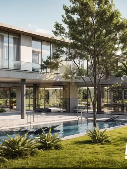 A daytime view of the Aravalli farmhouse project, highlighting the private swimming pool that anchors the landscape. This perspective shows the seamless transition between indoor and outdoor living, celebrating restrained luxury and a connection to nature.